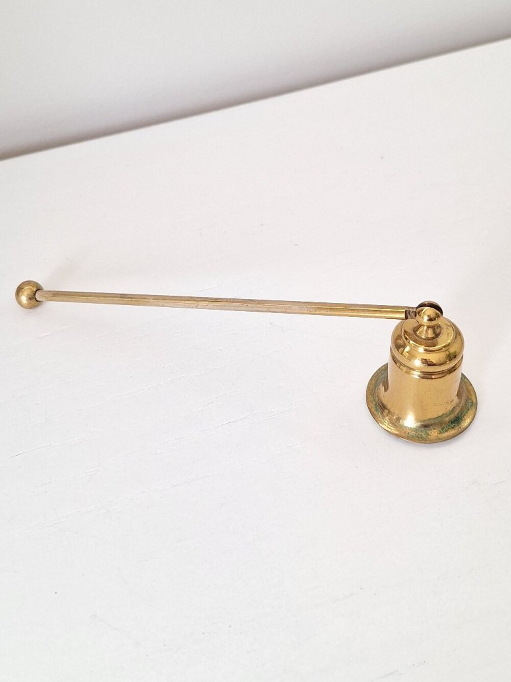 Vintage brass candle snuffer